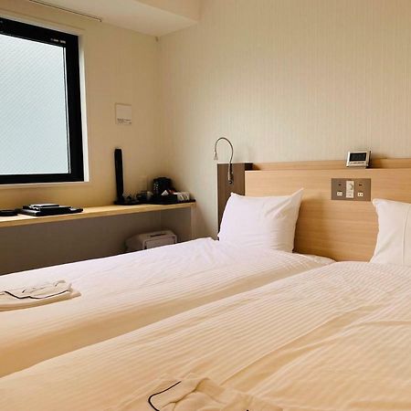 Toyotomi Inn 難波高津 Osaka Bagian luar foto