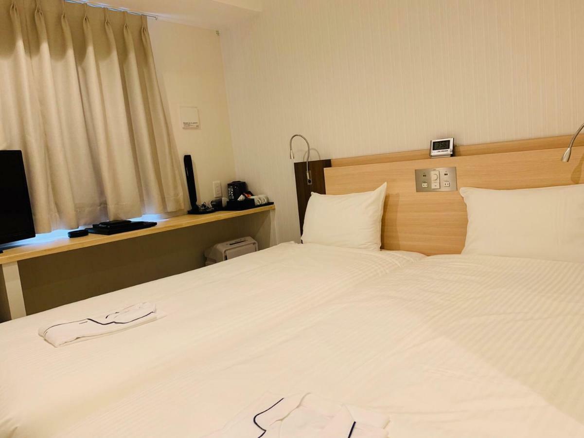 Toyotomi Inn 難波高津 Osaka Bagian luar foto