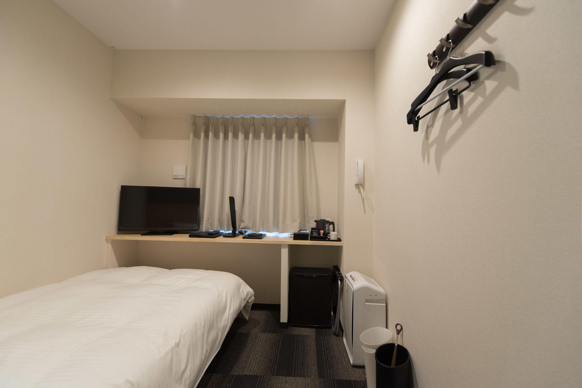 Toyotomi Inn 難波高津 Osaka Bagian luar foto